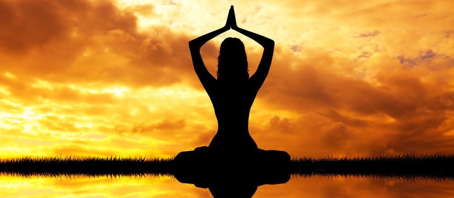 Woman silhouette meditating visudha chakra