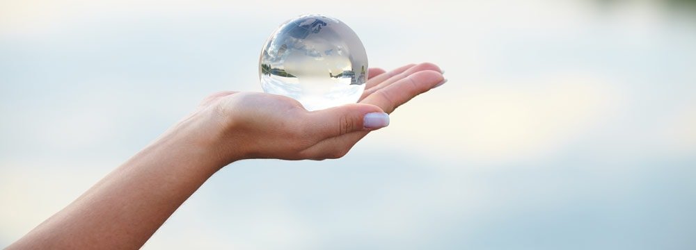 Crystal ball in hand